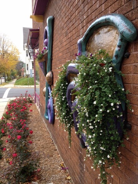 Gardens surround the building - 632 E Burleigh St