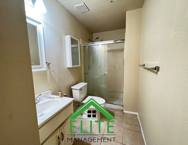 Building Photo - **Spacious 3-Bedroom Condo with 2-Car Gara...