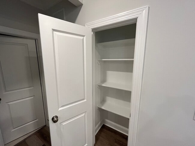 Building Photo - Newly Built 4BD, 3BA Cary Townhome with Modern Amenities and Screened-In Patio