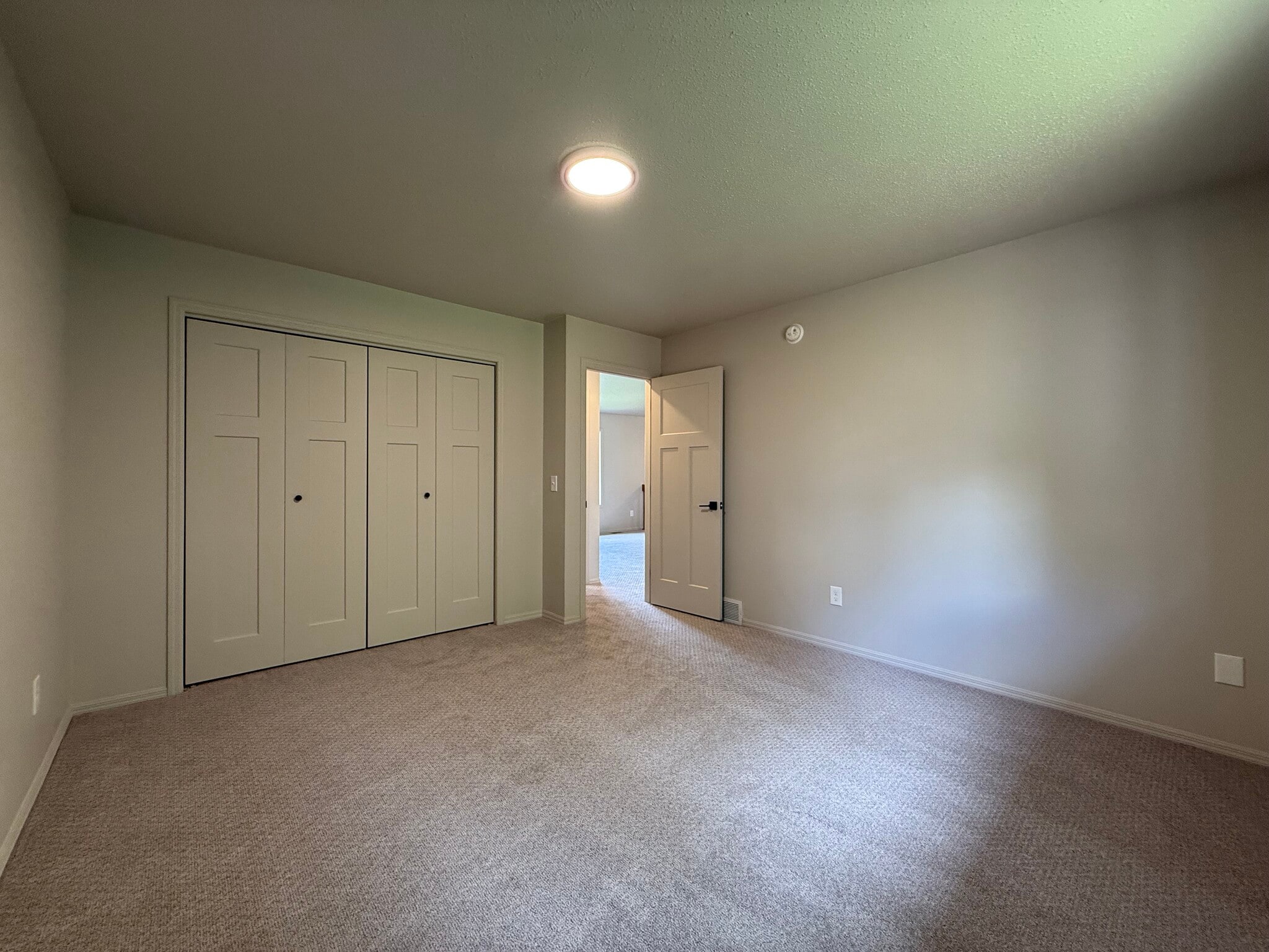 Upstairs bedroom #2 with four-panel doors - 2005 S Gordon Dr