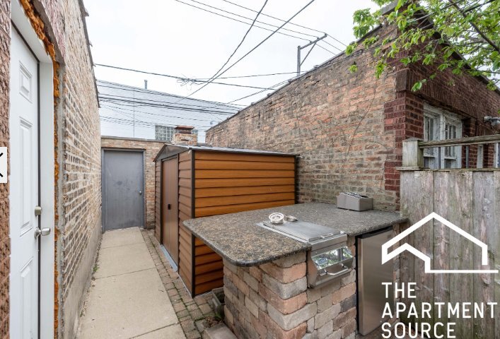 Building Photo - 5921 N Artesian Ave