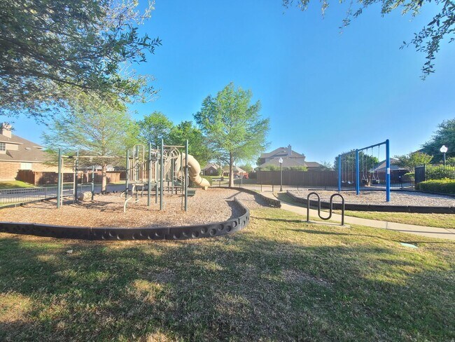 Building Photo - Rowlett Home in Great Location w/ Community Park, Pools, & Playground. Includes All Appliances!