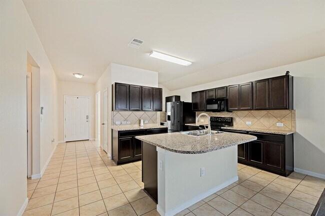 Building Photo - 5916 Montrelia Dr