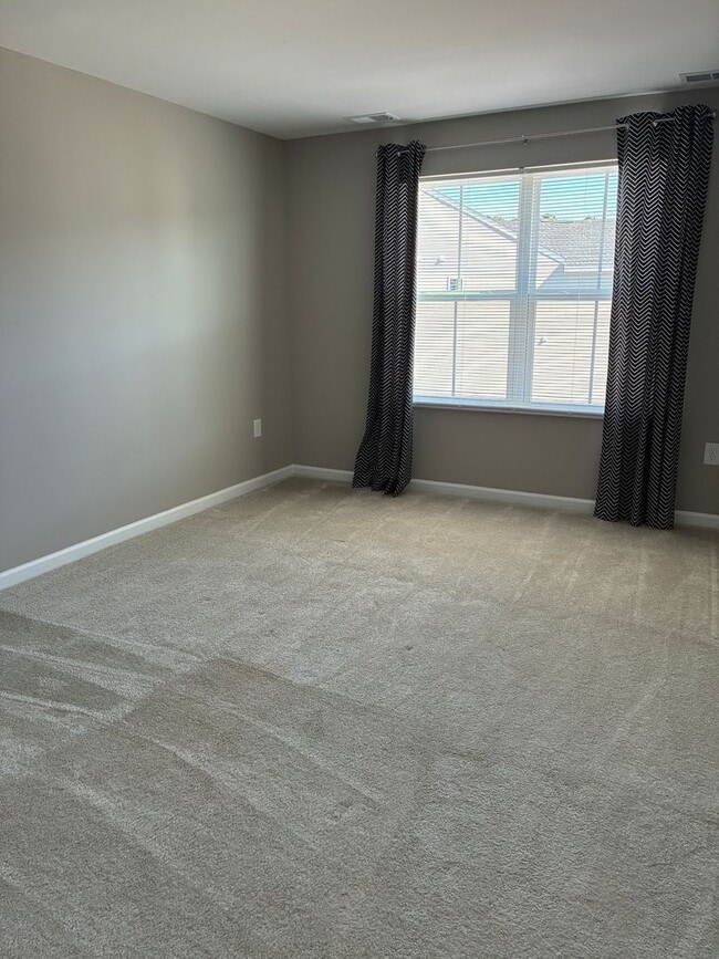 Building Photo - FORMER MODEL townhome at Villa Grande community