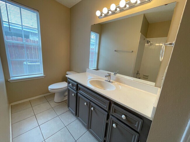 Building Photo - Live near the schools, shops, and dining y...