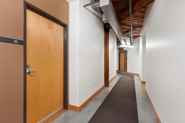 Building Photo - Chic, urban studio condo in the Pearl—Peaceful, In-unit w/d, 14-ft ceilings, deeded parking