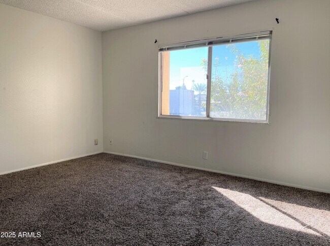 Building Photo - 7910 E Camelback Rd