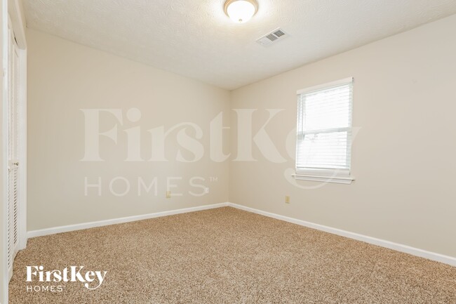 Building Photo - 6585 Evans Dr