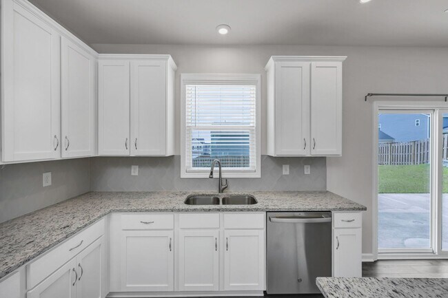 Building Photo - Sophisticated Like-New 4-Bedroom Home with Designer Finishes & Fenced Backyard!