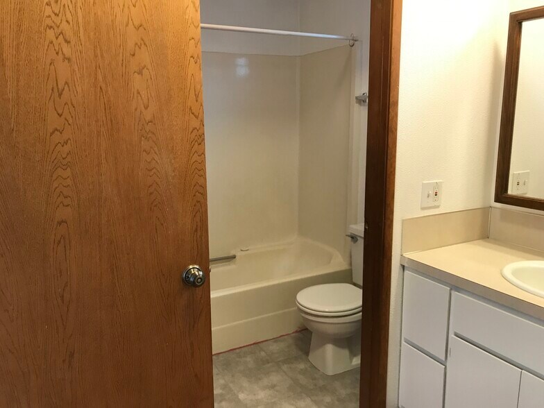 Studio: new bathroom floor - 1609 7th Ave SE