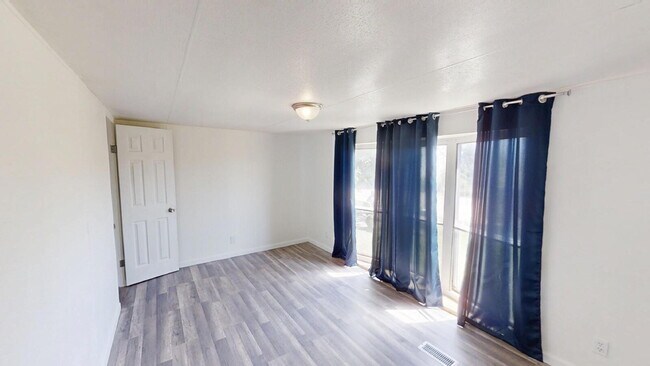 Building Photo - "Charming 3-Bed, 2-Bath Mobile Home Retrea...