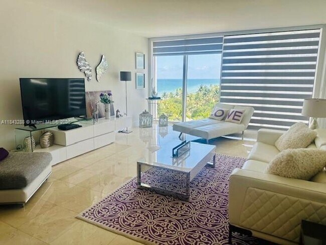 Building Photo - 10275 Collins Ave