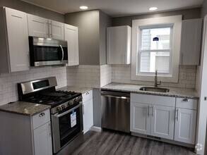 Building Photo - End row home with stainless appliances, wa...