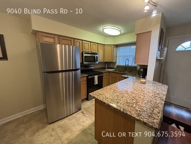Building Photo - 9040 Blind Pass Rd