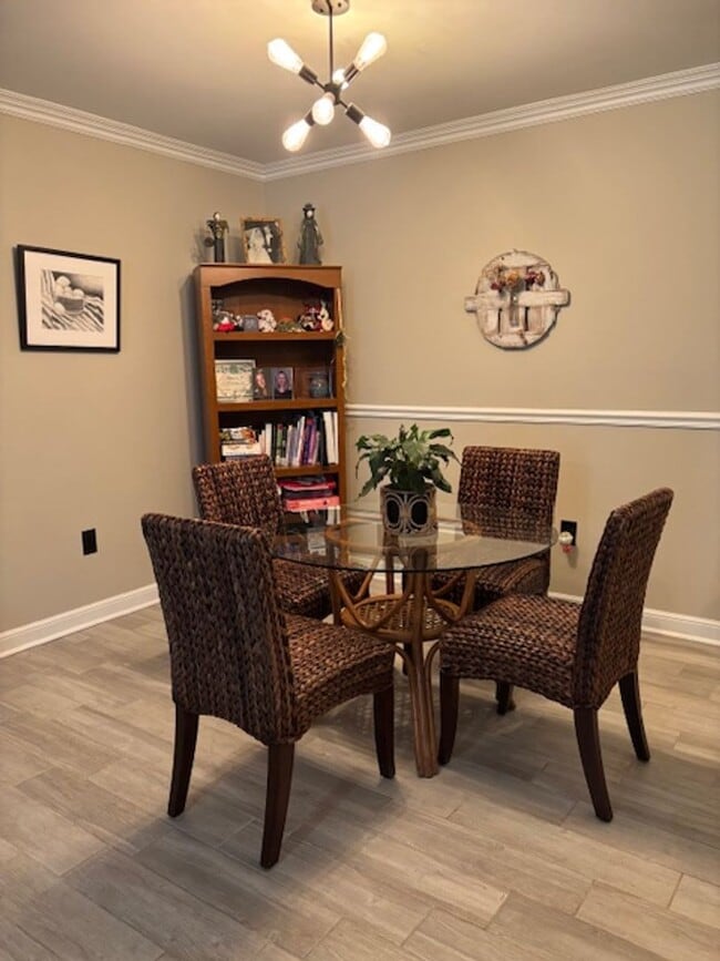 Building Photo - Charming One-Bedroom Condo with Marsh View...