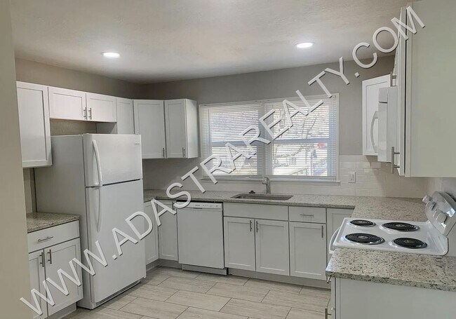 Building Photo - Beautiful Newly Remodeled Raytown Home-Coming SOON!!