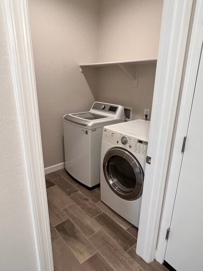 Separate laundry room - 37640 W San Sisto Ave