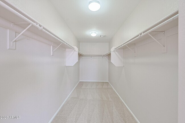 Building Photo - 15569 W Gelding Dr