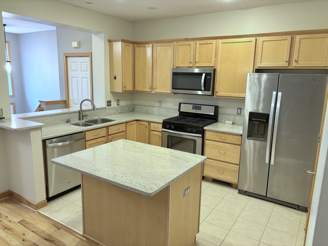 Large kitchen with stainless steel appliances - 2327 Eagle Trace Ln