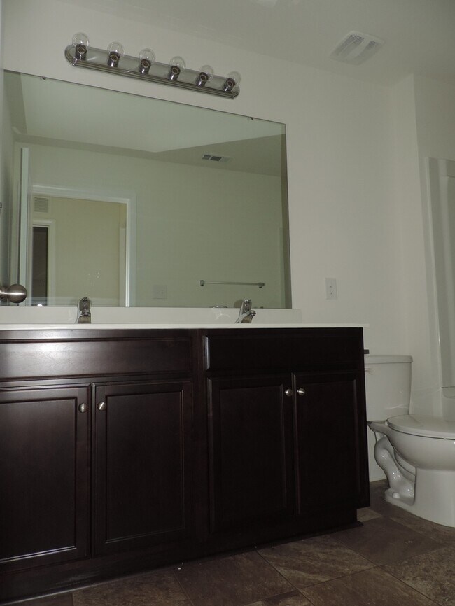 Building Photo - New, 4 bedroom home in the Hallstead commu...
