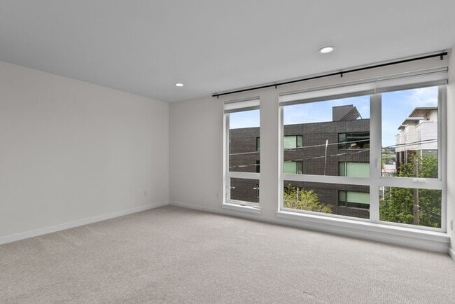 Building Photo - ULTRA-MODERN Townhome w/AC and Views in the Heart of Eastlake!