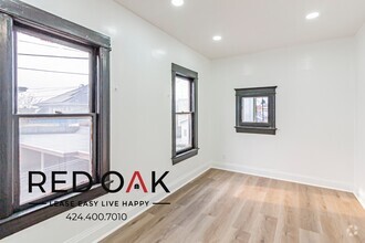 Building Photo - Newly Redone, Top Floor Two Bedroom with L...