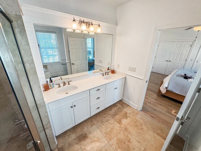 Building Photo - Fully Furnished Waterfront Elegance on Mai...