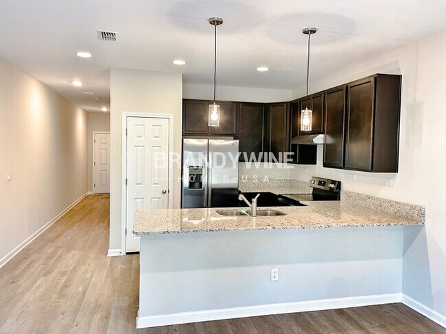 Building Photo - NEW Lower Rental Rate Leasing Special: Mar...