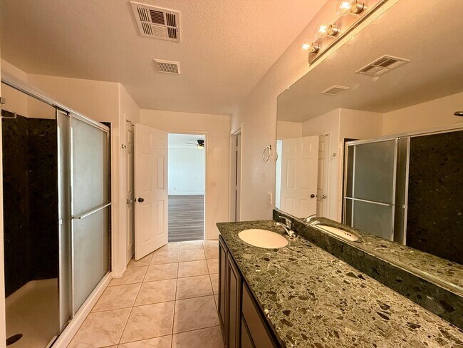 Building Photo - COMING SOON 5/BD 3/BA Home W/ Expansive Yard, Solar Panels, and No Rear Neighbors!