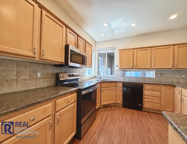 Building Photo - Spacious 4BR/2.5BA Beaverton Home with 3-Car Garage and Covered Deck