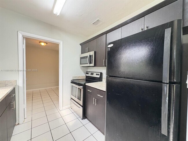 Primary Photo - 1051 NW 26th Ave