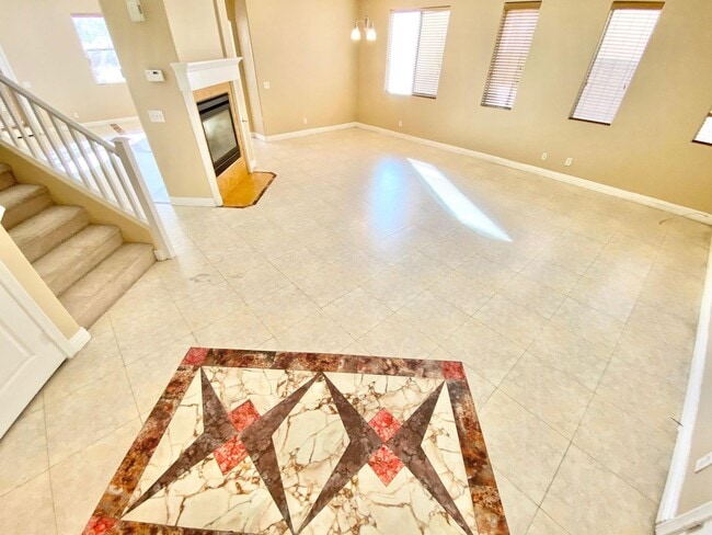 Building Photo - THIS SPACIOUS RESIDENCE FEATURES 4 BEDROOM...