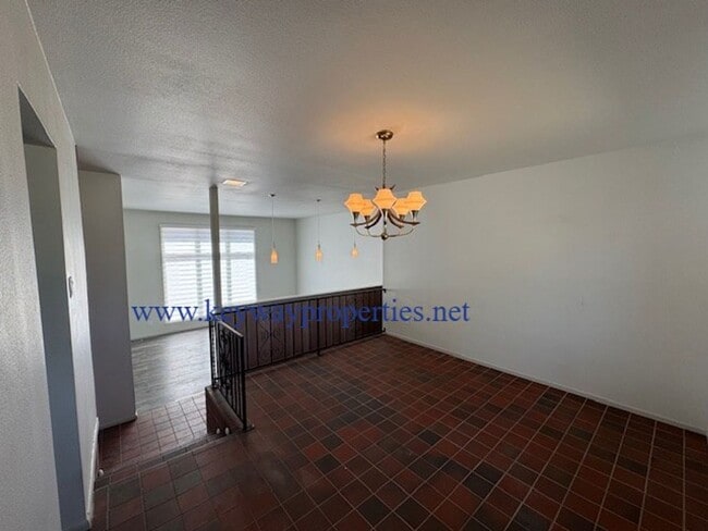 Building Photo - Welcome to Your New Home in NE Heights – Spacious, Stylish, and Full of Charm!