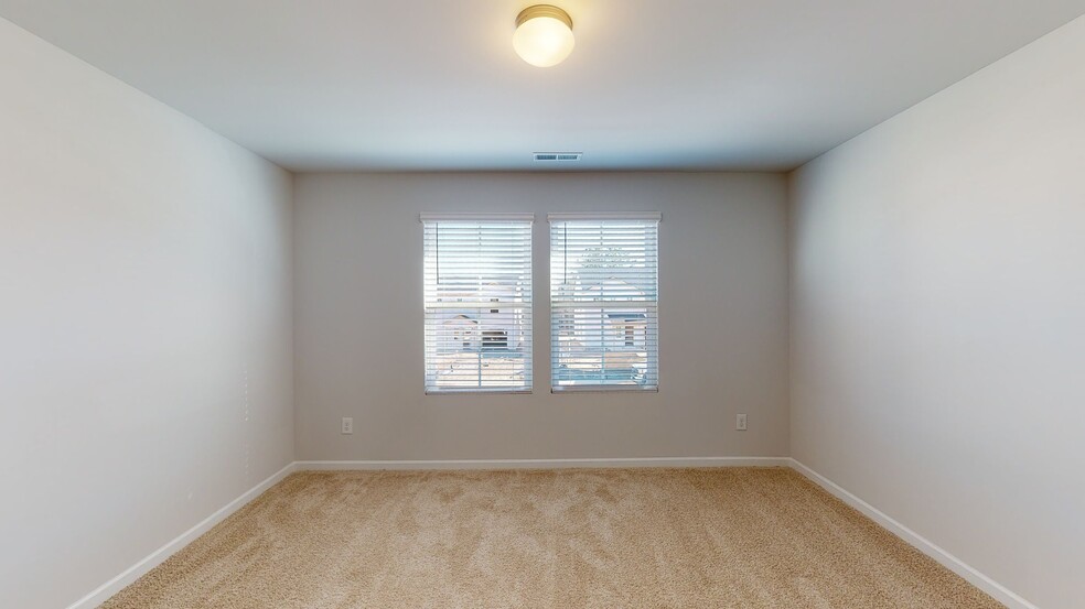 Downstairs Bedroom - 117 Maple Tree Ln