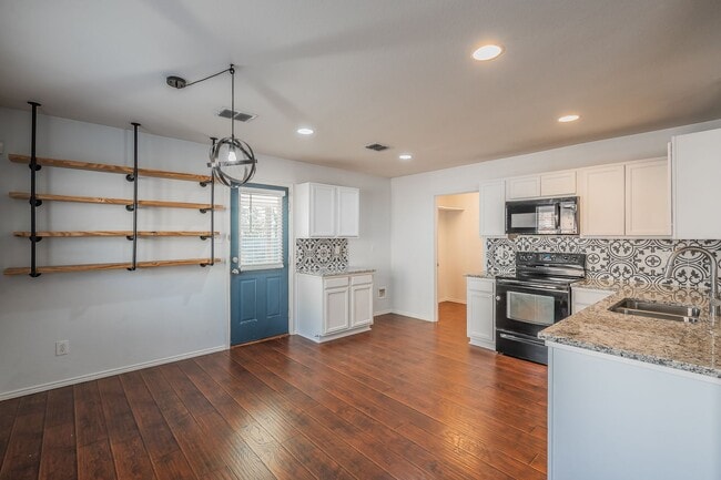 Building Photo - Updated and super clean single story 3 bed...