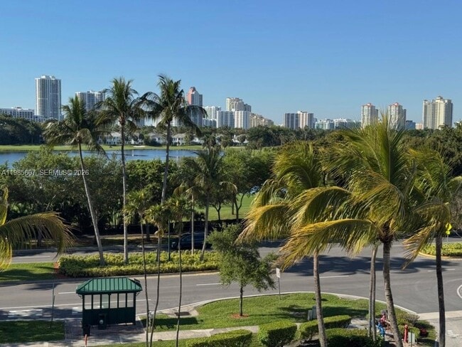 Building Photo - 3675 N Country Club Dr