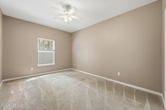 Building Photo - Ground Floor 2 bedroom 2 bathroom Condo in Gated Community with Amenities