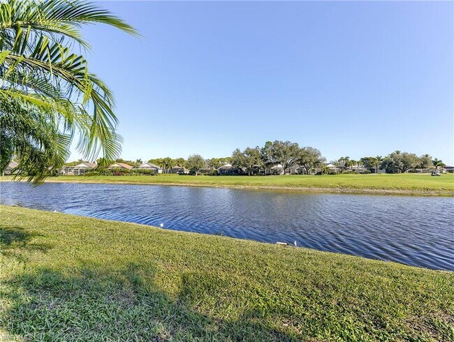 Building Photo - Turnkey 2-bedroom plus den villa, perfectly situated to capture stunning golf course and lake vie...