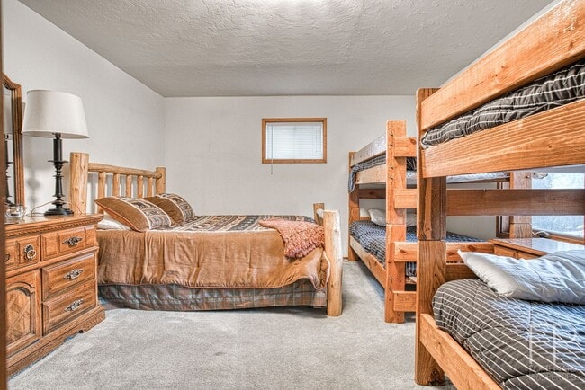 Building Photo - On the Blue River!  HUGE 4 Bedroom home, Furnished Updates throughout!  Bus route!  Spacious parking