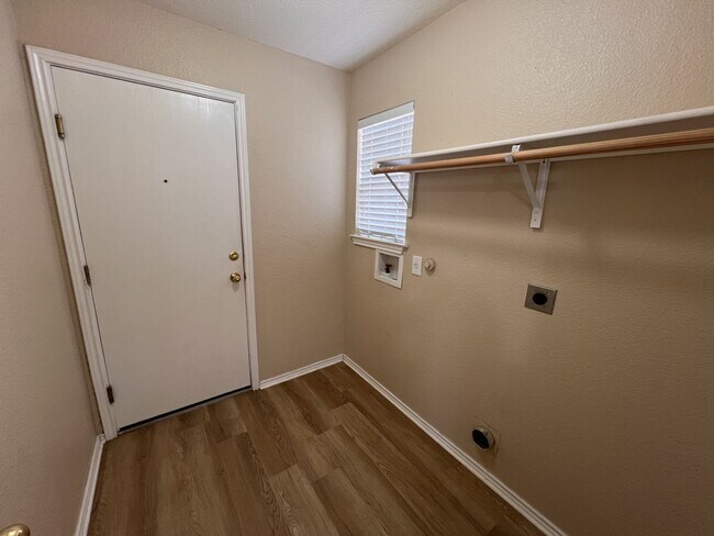 Building Photo - Generous Outdoor Space & Lawn Care Included!