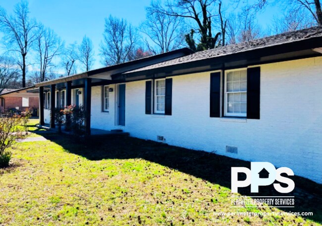 Building Photo - 6127-6129 E Fayetteville Dr