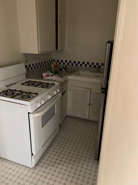 Kitchen With Custom Tile Floors - 824 1/2 S Curson Ave