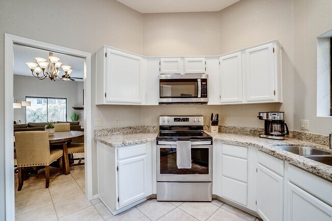 Building Photo - Resort Style Living - Furnished Three Bedr...