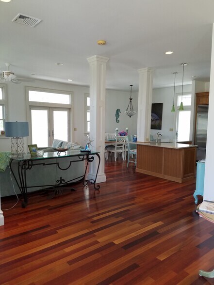 open concept first floor with living space, dining and kitchen - 35 Pine Island Rd