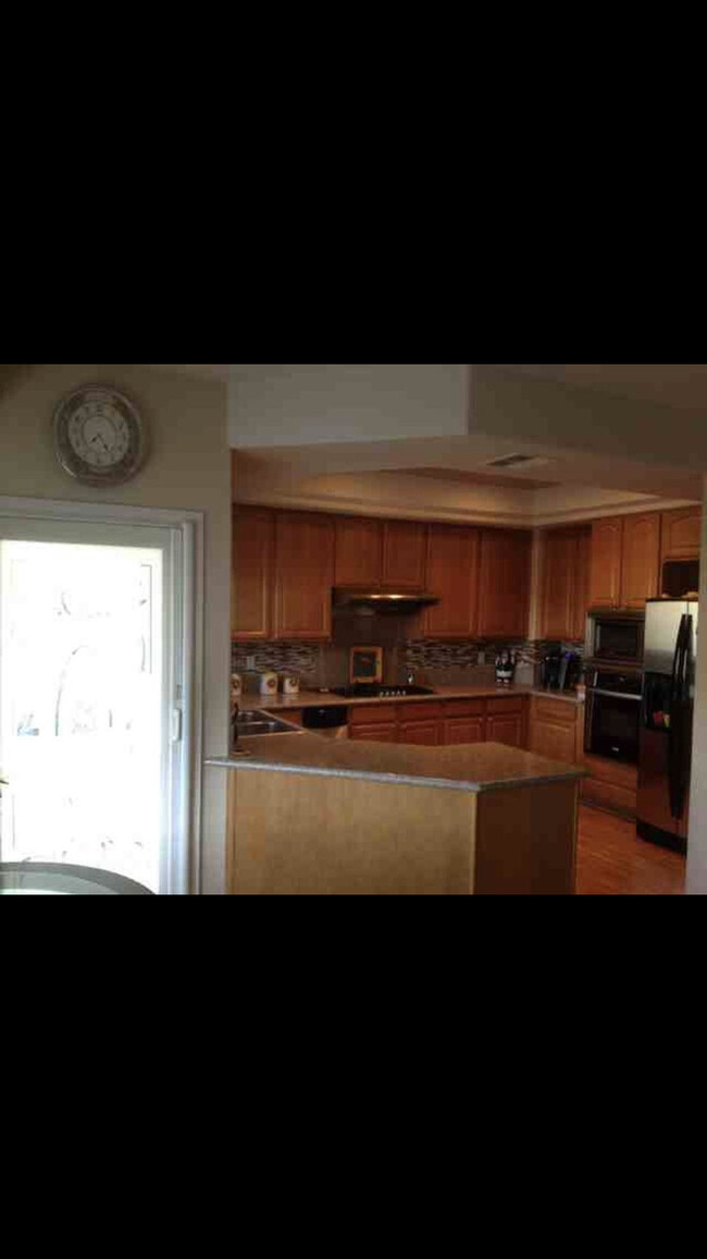 balcony from the kitchen / family room - 4489 Spencer St