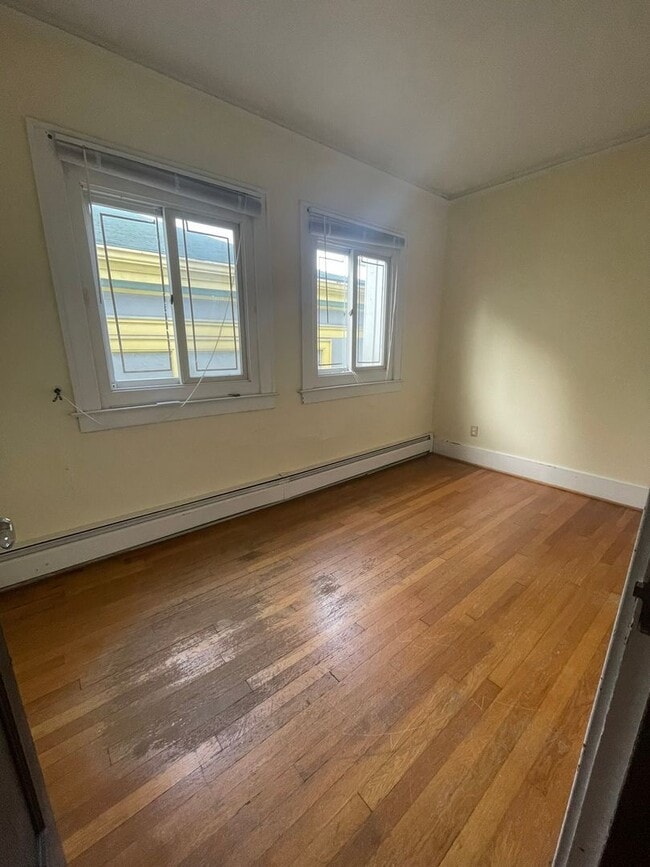 Building Photo - One Block to the Diag! Charming Home with Private Courtyard + Parking