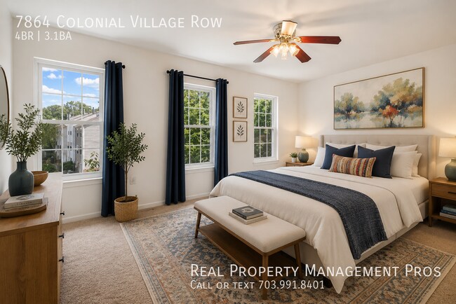Building Photo - 7864 Colonial Village Row