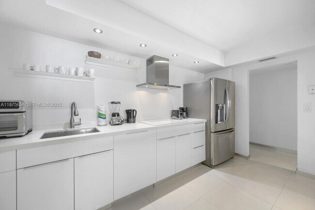 Building Photo - 19370 Collins Ave