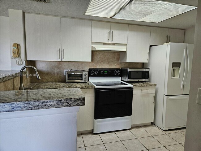 Building Photo - 5011 Wiles Rd