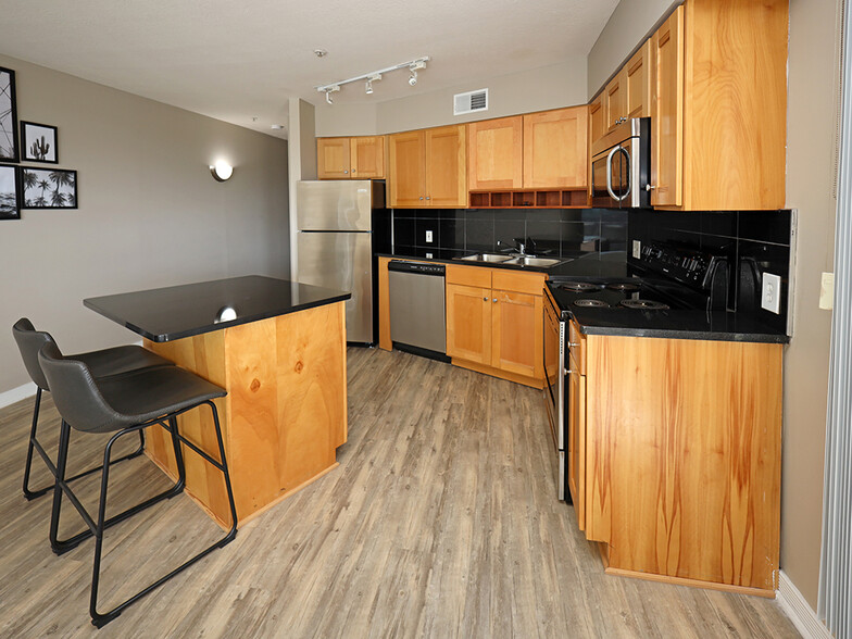 Updated Model Kitchen with All New LVT Hard Surface Flooring - Stonebridge Waterfront